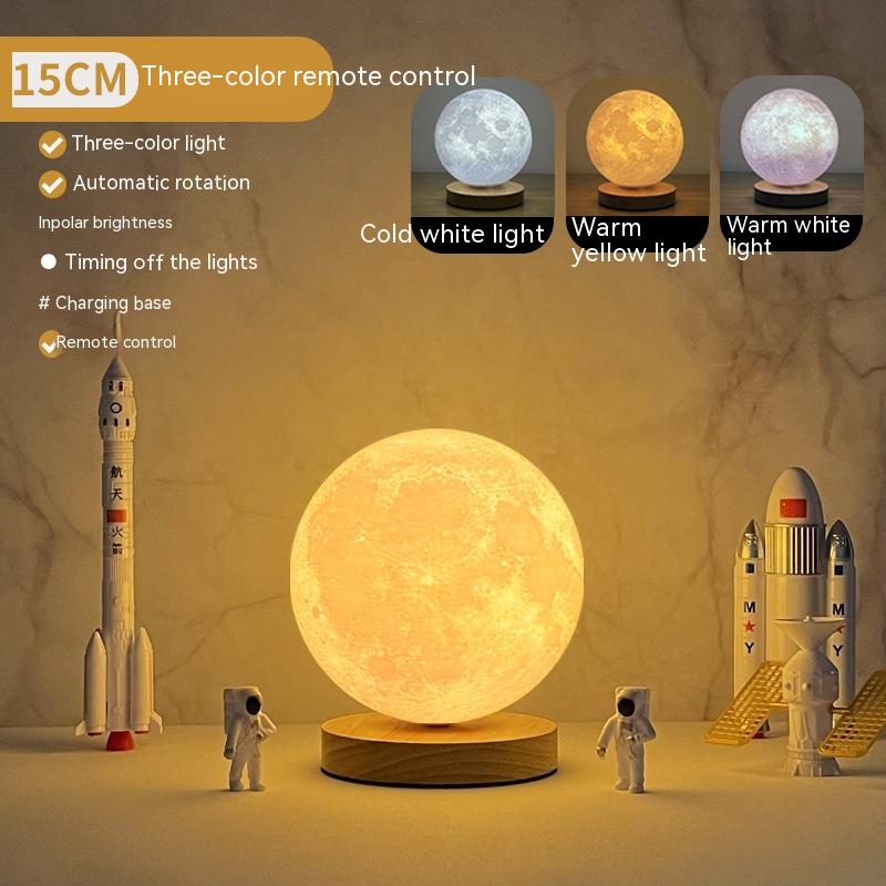 Magnetic levitating moon lamp displaying three-color remote control options and astronauts with rockets.