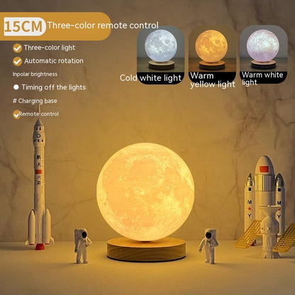 Magnetic levitating moon lamp displaying three-color remote control options and astronauts with rockets.